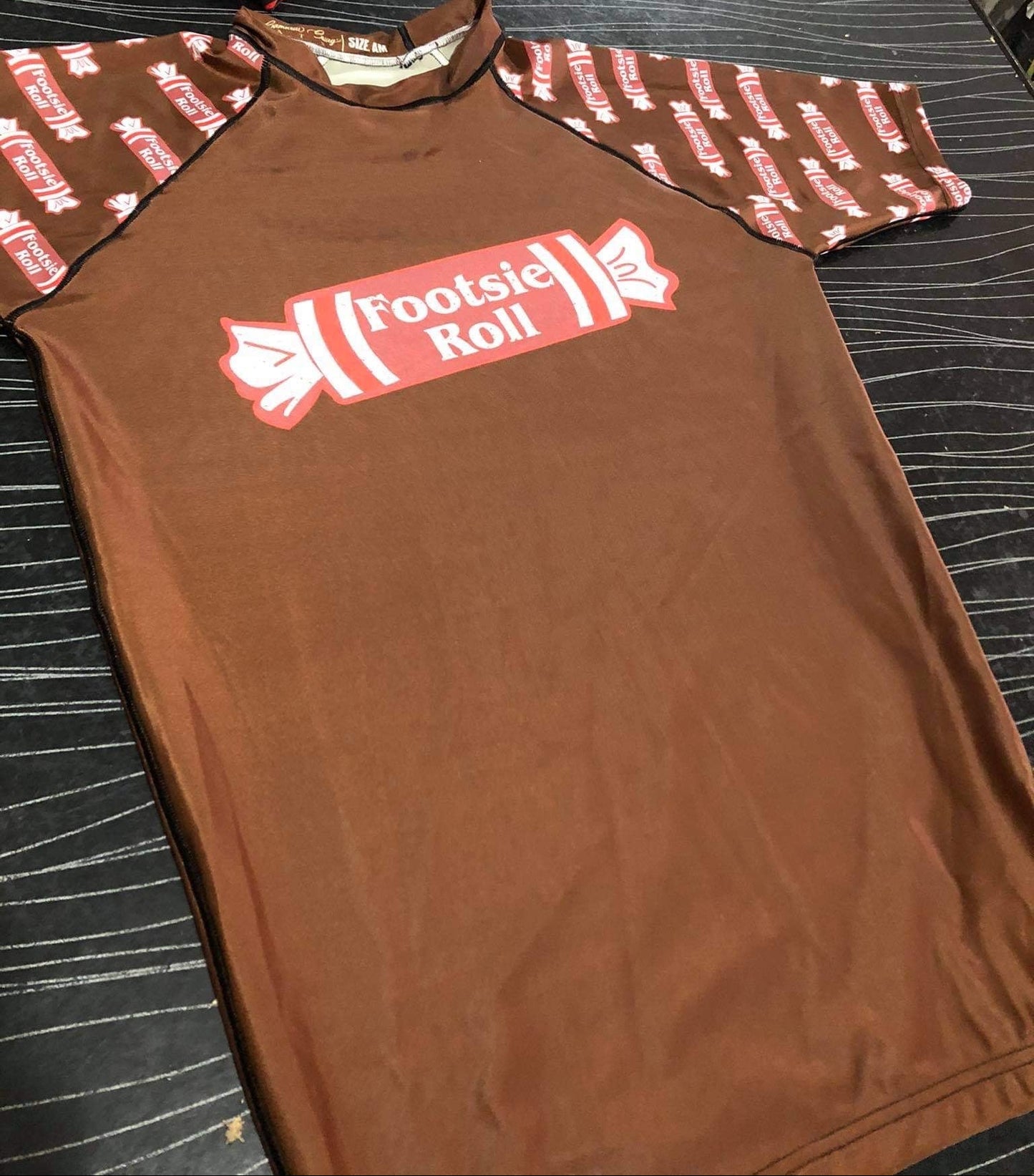 Footsie Roll Rashguard